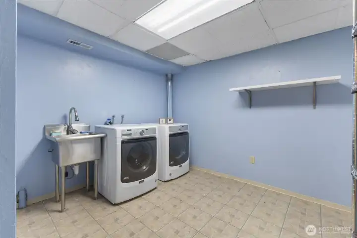 HUGE lower level 2nd laundry / storage room