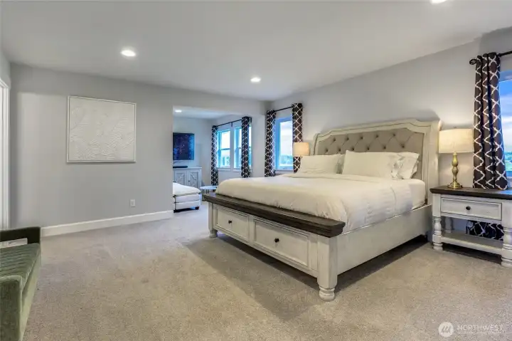 Primary bedroom looking toward primary bedroom sitting area