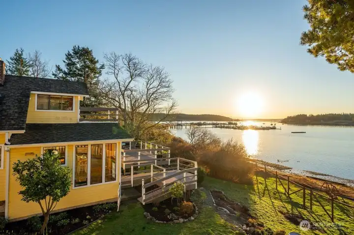 This historic farm cottage on offers a panoramic west-facing view of Lopez Island’s Fisherman Bay, stretching from the Olympics to Upright Channel and the islands beyond, on 135 ft of low bank waterfront