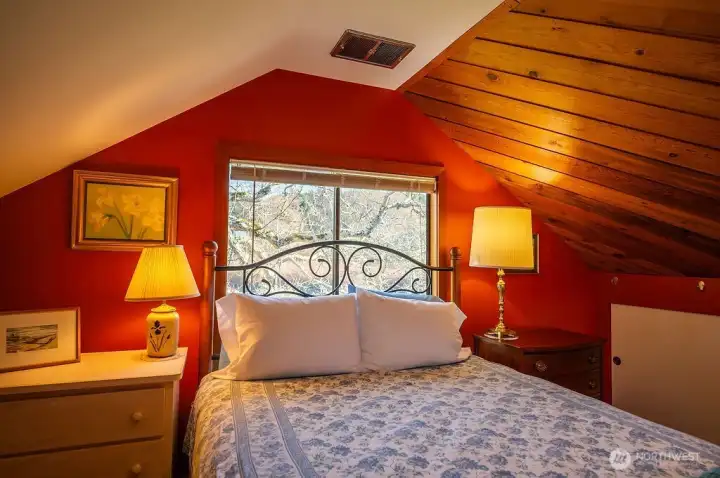 Main house upper level open bonus area, with storage on right