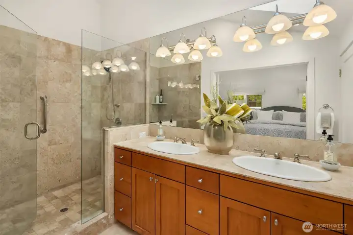 Large shower and double sink in the primary suite