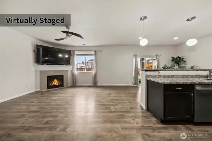 Living room & Kitchen. Photo has been edited to remove furniture.