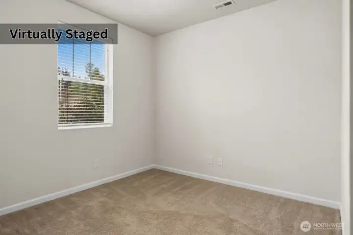 Front foyer room. Perfect for home office. Photo has been edited to remove furniture.