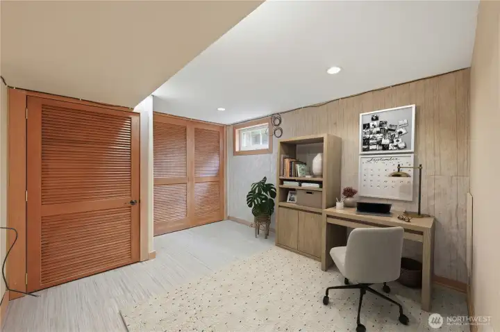 Virtually staged finished area with closet. Virtually staged finished area with closet.