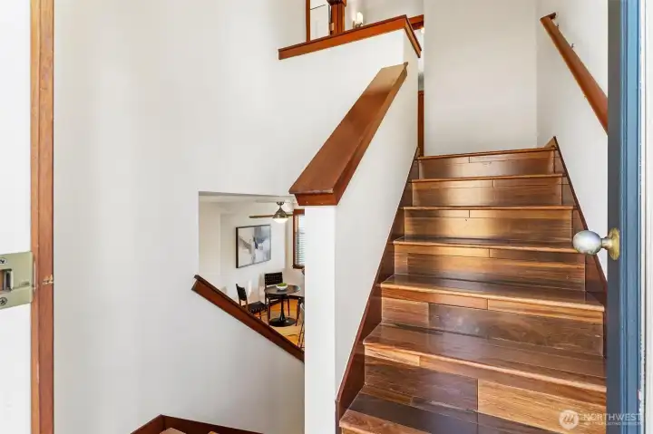 Stairway detail with warm wood finishes and efficient vertical layout.