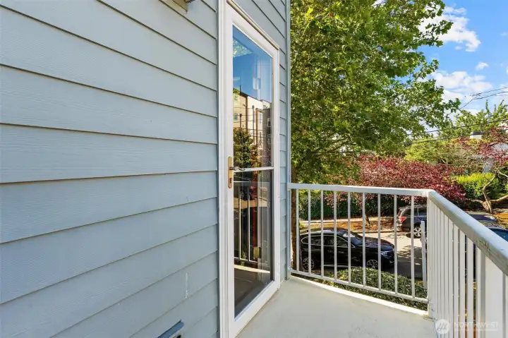 Private balcony offering fresh air and neighborhood outlooks.