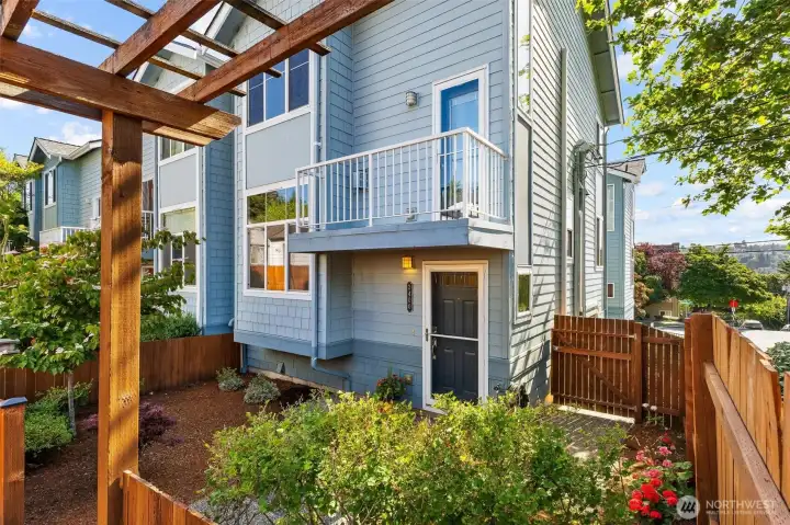 Community-facing exterior view emphasizing the townhome setting.
