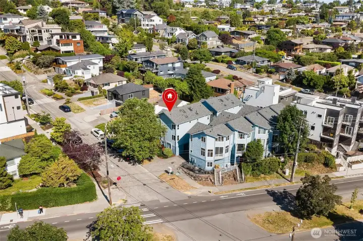 Elevated aerial capturing the surrounding Seattle neighborhood.