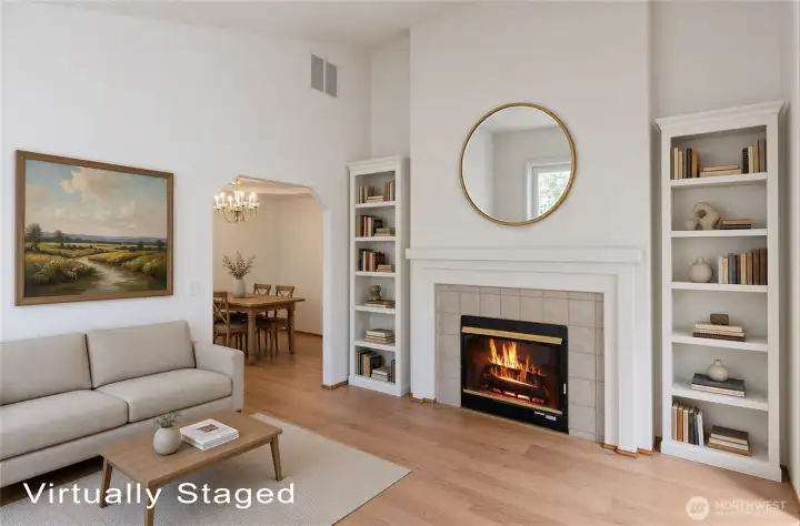 Formal living room accented by a double sided gas fireplace . Formal living room accented by a double sided gas fireplace .