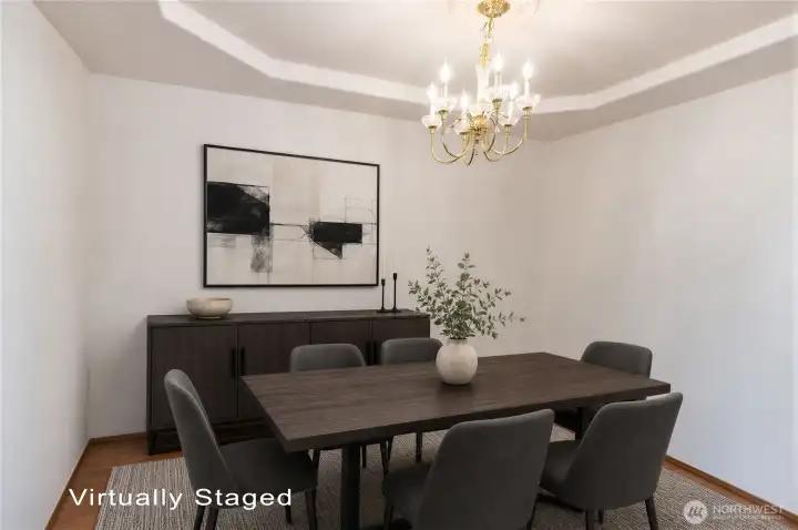 Formal formal dining room has coofered ceilings and close to kitchen Formal formal dining room has coofered ceilings and close to kitchen