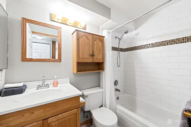 Bath features Tile Floor and Tile Tub Surround.