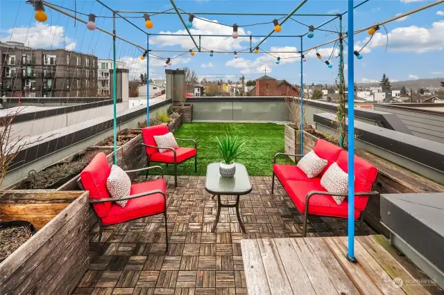 Custom built planters and wood decking for more living space.