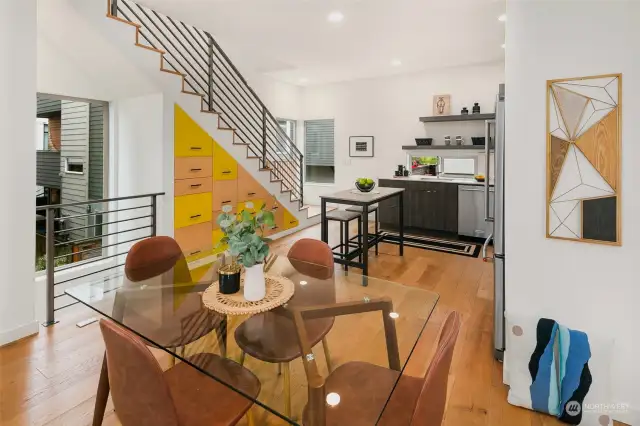 Open living and dining room with private outdoor terrace.