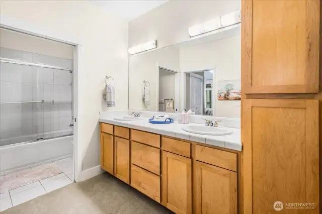 Pocket door to shower/toilet and also between bedroom and sink area.  Second entry into unit by flex space.
