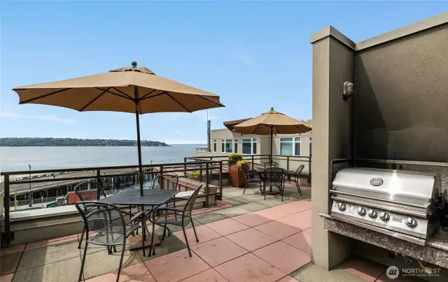 Terrace with BarBQ area. There's also a small kitchen with refrigerator and sink.