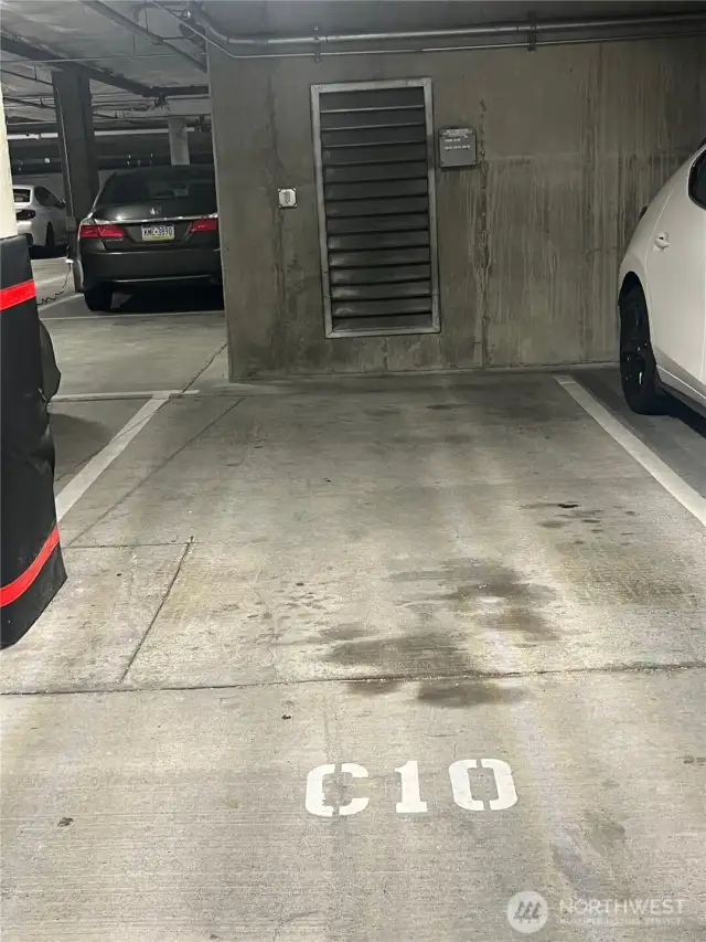 C10 parking space is close to electrical for HOA approved EV charger, owner installed