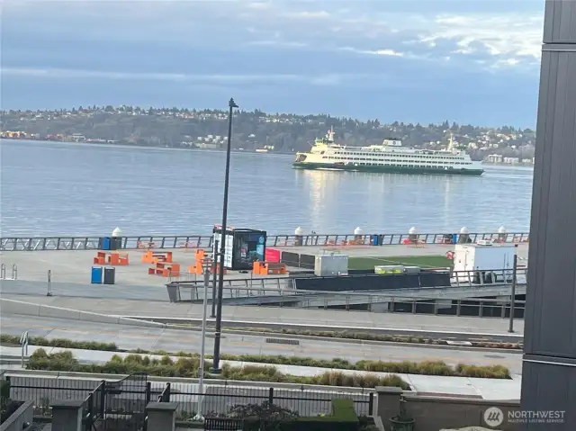 Ferry travel Lane runs in front of building by Pier 62. Vview from balcony.