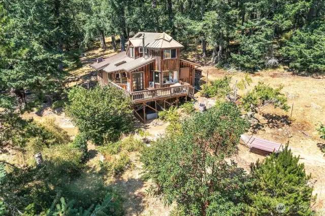 Two lots totaling ten forested acres with clearings and mossy knolls.