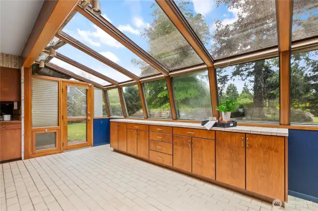 Solarium looks out to a gorgeous private yard