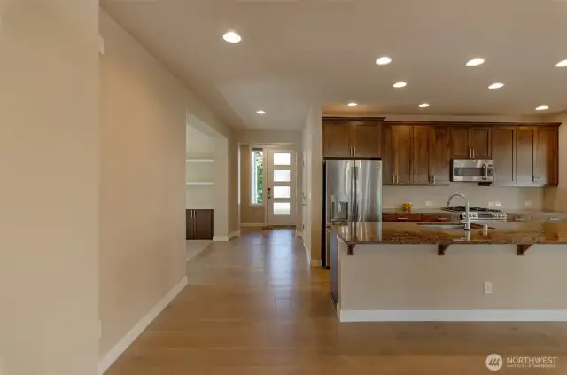 Look how open and inviting this floor plan is.  Wide open hallway leads to entry.