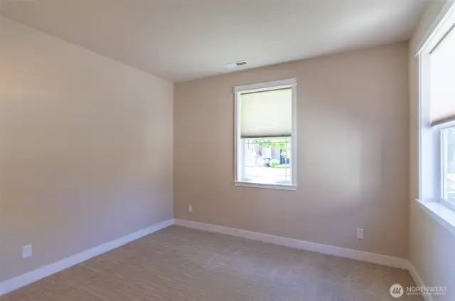 View of second bedroom, which is located near the front of the house.