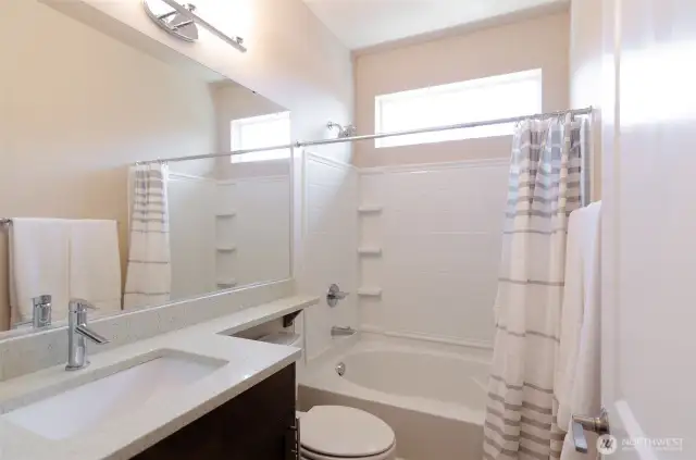Full hall bath is situated close to the second bedroom