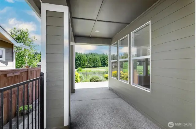 Covered side porch offers privacy and still take in the view.