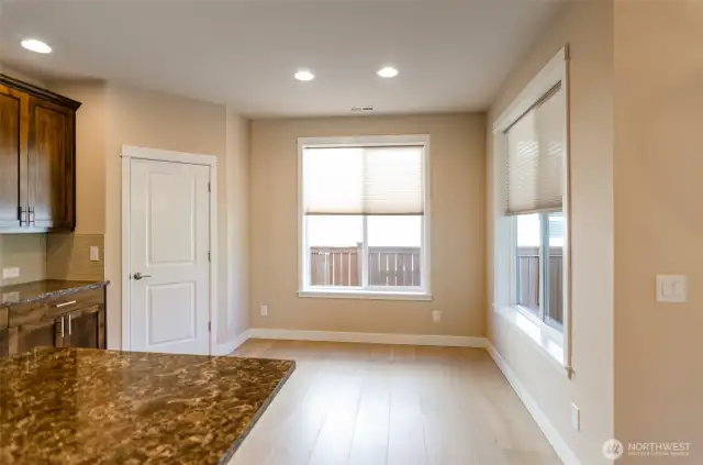 View of breakfast nook.  Room for table and chairs or seating area.
