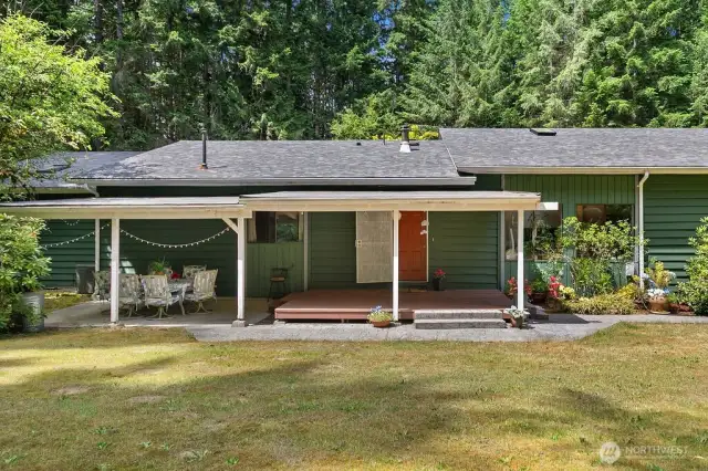 COVERED PATIO & DECK (NOTE THE BRAND NEW ROOF)