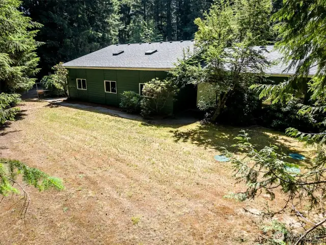 SIDE YARD VIEW - FRONT DOOR SIDE