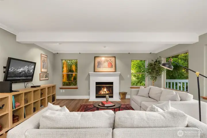 Lower level features a full second living room, super cozy, with sliding doors out to a deck.