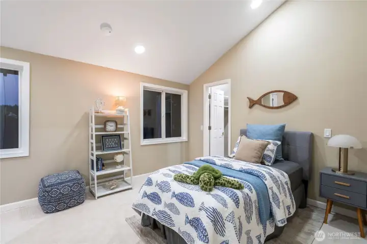 5th bedroom w/attached 1/2 bath & laundry