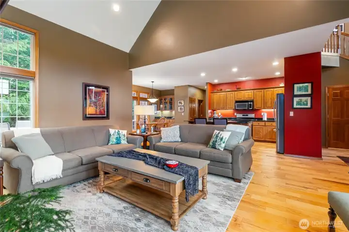 From this angle taken from the living room, you can really see how open the main floor is expanding to the kitchen and dining areas.