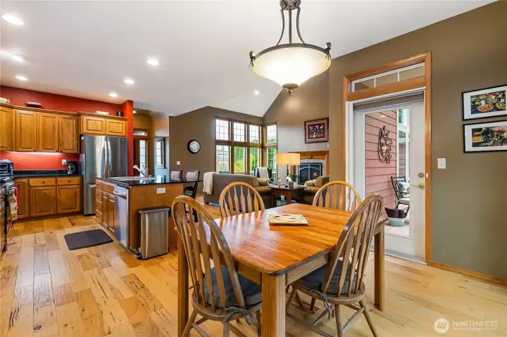 Dining and kitchen area with door leading to back deck.
