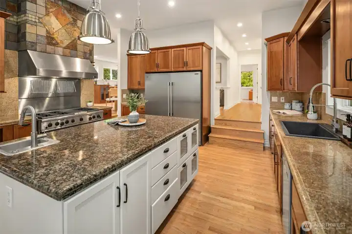 Huge kitchen island with prep sink.