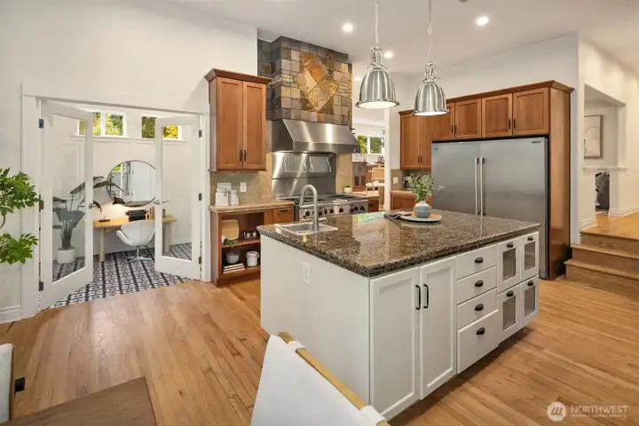 Kitchen showing french doors to den.