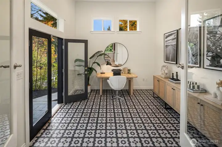 Den with french doors to patio.