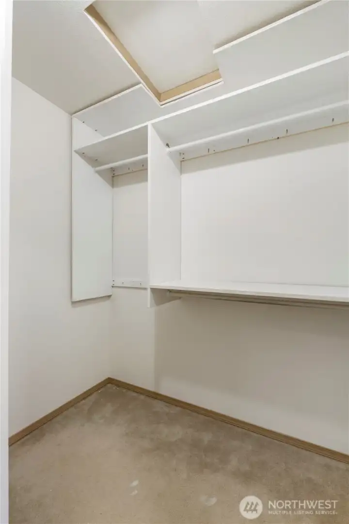 Primary walk-in closet.