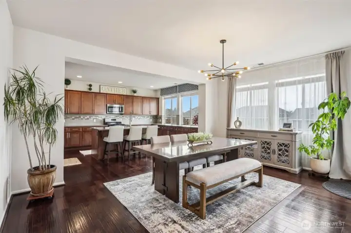 The residence boasts an inviting open concept floor plan that allows for effortless movement and seamless connectivity, naturally flowing into the heart of the home, the exquisitely designed gourmet kitchen.