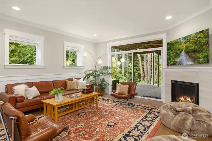 Gathering room for movie night! Another fireplace and sliders to outdoors...