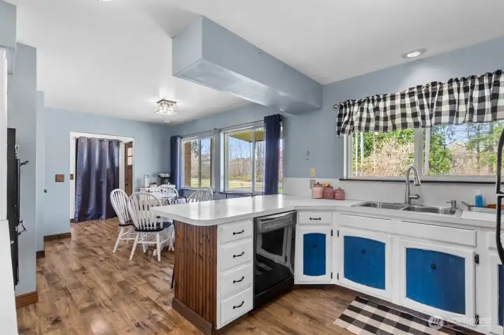 The kitchen is open to the casual dining area.