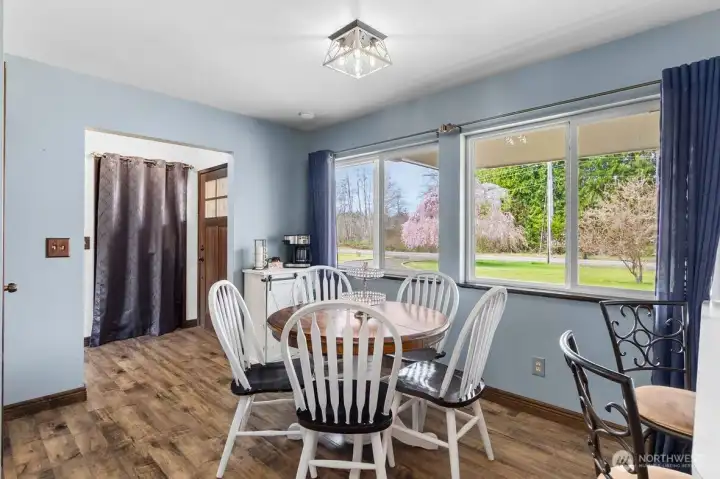 Bright dining space designed to capture natural light throughout the day.