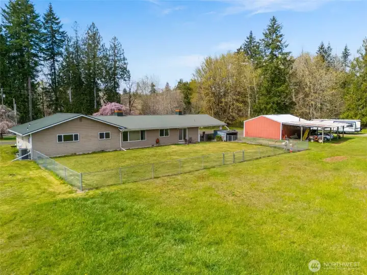 Generous lot with room for hobbies, animals, or gardens.