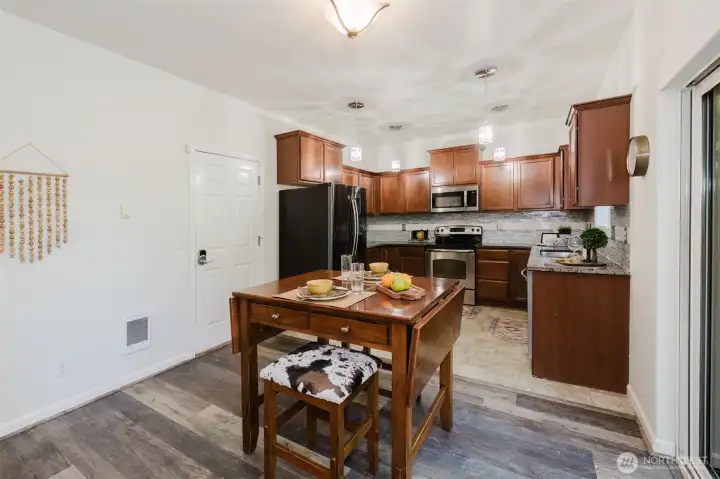 Dining area between living room and kitchen