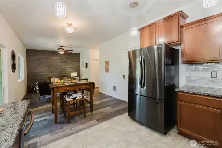From kitchen looking into dining area and living room