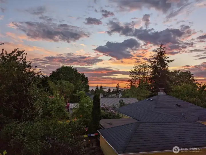 Older photo from seller before nearby townhome was built...but you can see the potential sunset views...spectacular!!!