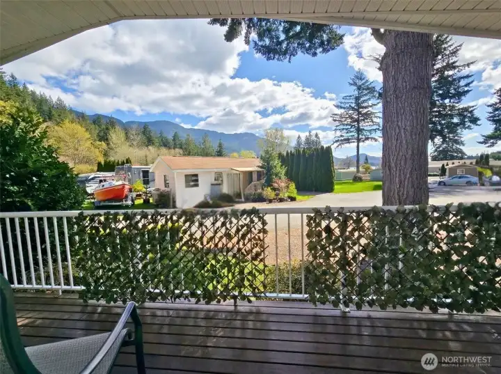 Enjoy morning coffe with sweeping views of  the foothills and peek-a-boo views of Lake  Samish