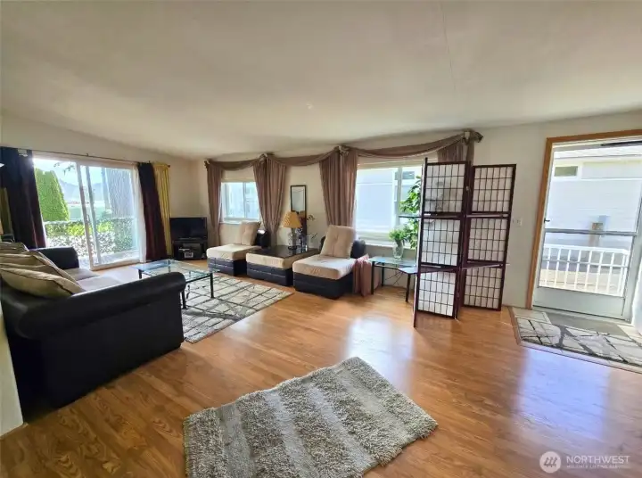 Spacious living area with flexible layout  options and natural light