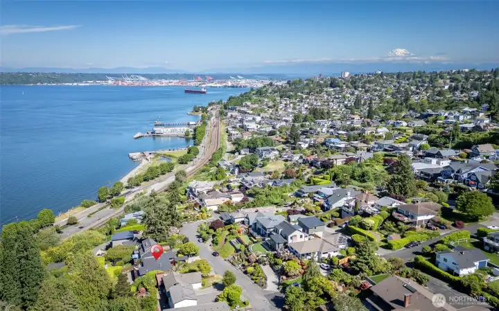 Wake up to Commencement Bay views so expansive, you'll feel the water is your own. Watch Wednesday evening sailboat regattas, marvel at yachts, cargo ships, and sea planes, thrill at the December Christmas Boat Parade, and catch the occasional Orca surfacing while Bald Eagles soar overhead. The Fourth of July fireworks? Front-row seats. Straight north, Browns Point Lighthouse anchors a sweeping panorama that takes in Vashon Island, the Cascade foothills, and from the deck and upper southeast bedroom with a stunning Mt. Rainier view to the northeast. This is Tacoma's ultimate view property.The chef's kitchen is equally extraordinary, anchored by a Sub-Zero refrigerator, Miele espresso machine, Gaggenau oven, and steam oven. It opens to an enormous deck purpose-built for entertaining with that breathtaking panorama as your backdrop.This beautiful brick home was remodeled to the studs in 2005, and the current owner has continued investing into the exterior amenities that include; extensiv Wake up to Commencement Bay views so expansive, you'll feel the water is your own. Watch Wednesday evening sailboat regattas, marvel at yachts, cargo ships, and sea planes, thrill at the December Christmas Boat Parade, and catch the occasional Orca surfacing while Bald Eagles soar overhead. The Fourth of July fireworks? Front-row seats. Straight north, Browns Point Lighthouse anchors a sweeping panorama that takes in Vashon Island, the Cascade foothills, and from the deck and upper southeast bedroom with a stunning Mt. Rainier view to the northeast. This is Tacoma's ultimate view property.The chef's kitchen is equally extraordinary, anchored by a Sub-Zero refrigerator, Miele espresso machine, Gaggenau oven, and steam oven. It opens to an enormous deck purpose-built for entertaining with that breathtaking panorama as your backdrop.This beautiful brick home was remodeled to the studs in 2005, and the current owner has continued investing into the exterior amenities that include; extensiv