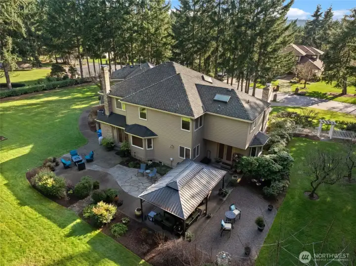 Escape into your own tranquil getaway, backyard designed for privacy and simple transitions for indoor-outdoor living.